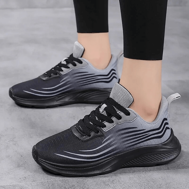 Women's mesh breathable flexible sneakers SF1708 for sports with gray and black design, perfect for active comfort and performance.